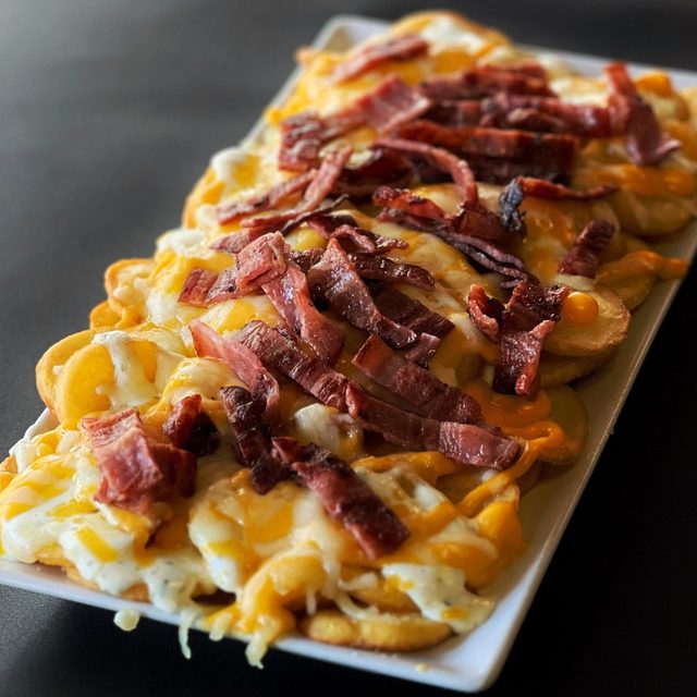 Foto de Cheese Bacon Fries
